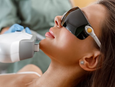 Intensive pulse light treatment going on of a young women | Revive MD Inc in Barrie, ON