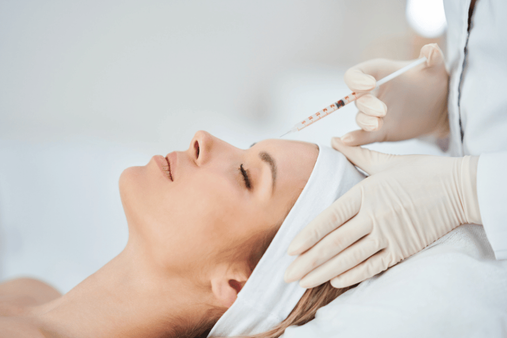 A patient receiving Sculptra injections at Revive Med Spa in Barrie, Ontario, as part of a non-surgical treatment to enhance the volume and contour of the buttocks and face. Sculptra uses poly-L-lactic acid to stimulate collagen production, providing a gradual and natural-looking lift and fullness, ideal for those seeking a non-invasive alternative to surgery for body and facial contouring.